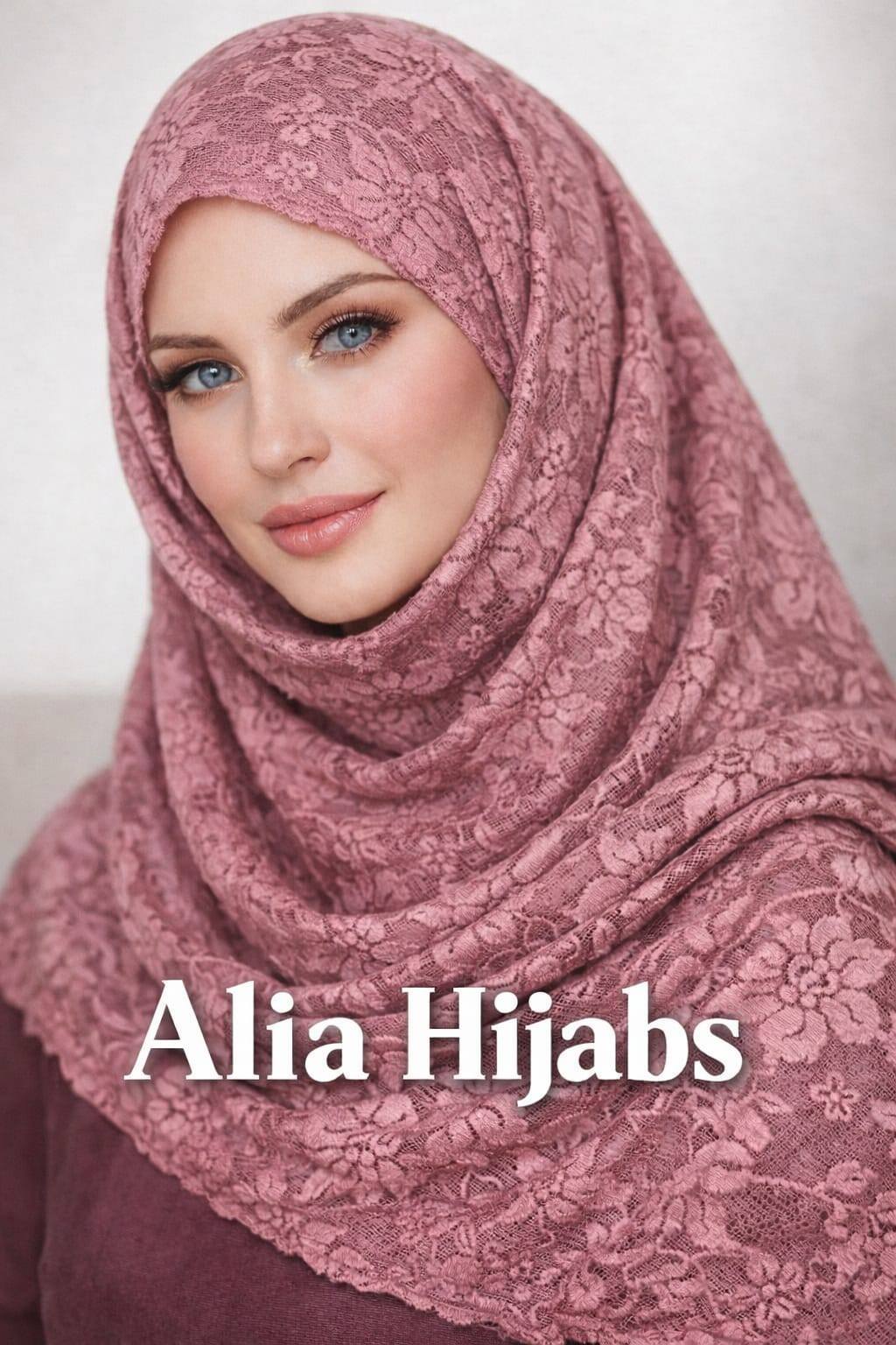 Woman wearing a pink hijab with 'Alia Hijabs' branding.