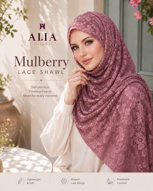 Woman wearing a pink lace hijab with 'Alia Hijabs' branding, set against a neutral background.

