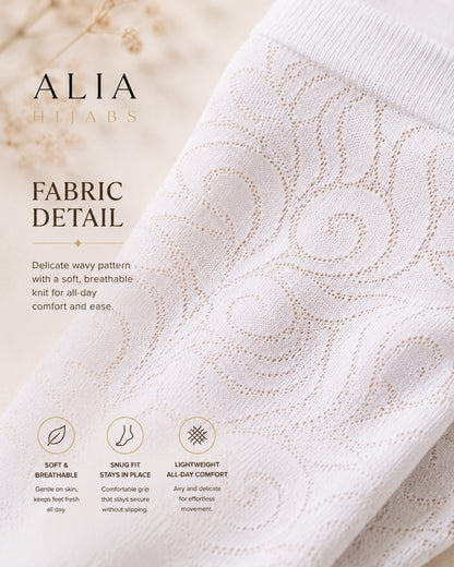White wavy lace ankle socks fabric detail showing breathable lightweight knit pattern and delicate floral-inspired texture.