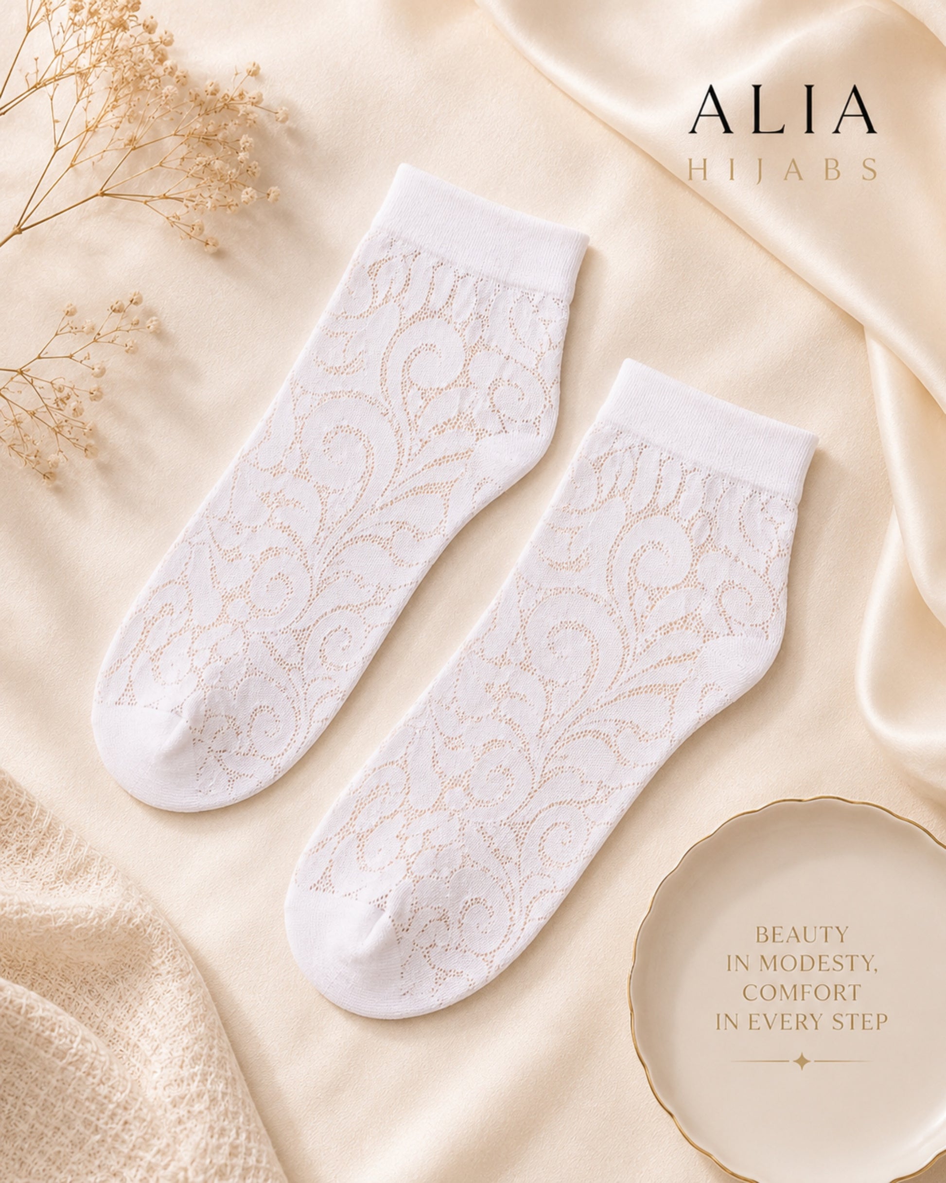 Luxury white lace ankle socks flat lay product photography featuring breathable patterned socks for women on an elegant ivory backdrop.