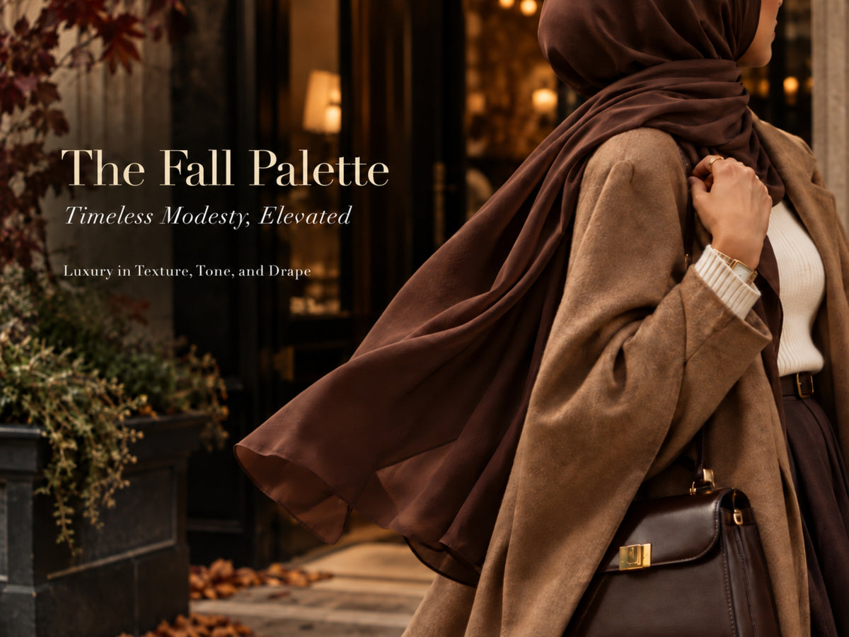 Close-up of a woman in a chocolate brown hijab and camel outerwear, highlighting flowing fabric, texture, and warm autumn tones.